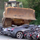 Illustration for article titled You Will Cry Watching the Philippines Crush This Lamborghini With a Bulldozer